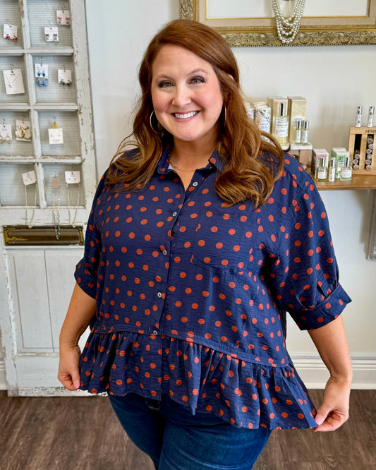 Navy Polka Dot Ruffle Hem Top