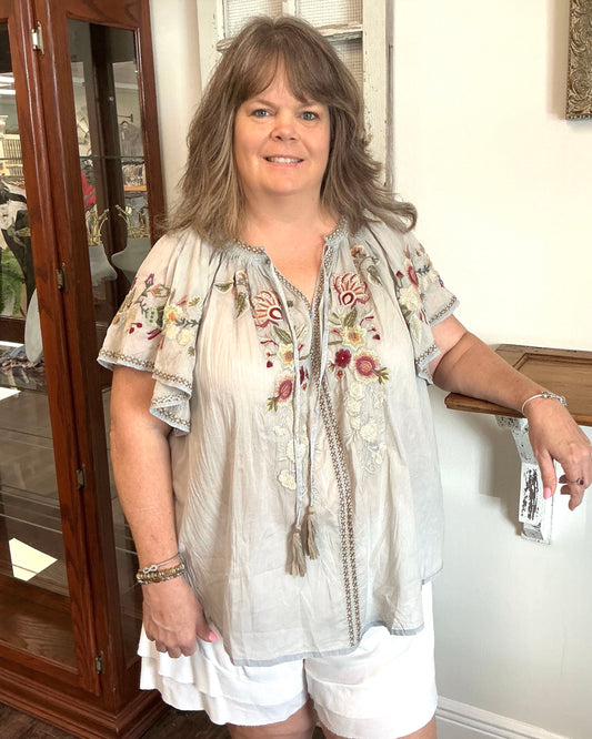 V-neck Tie and Multicolor Floral Embroidery