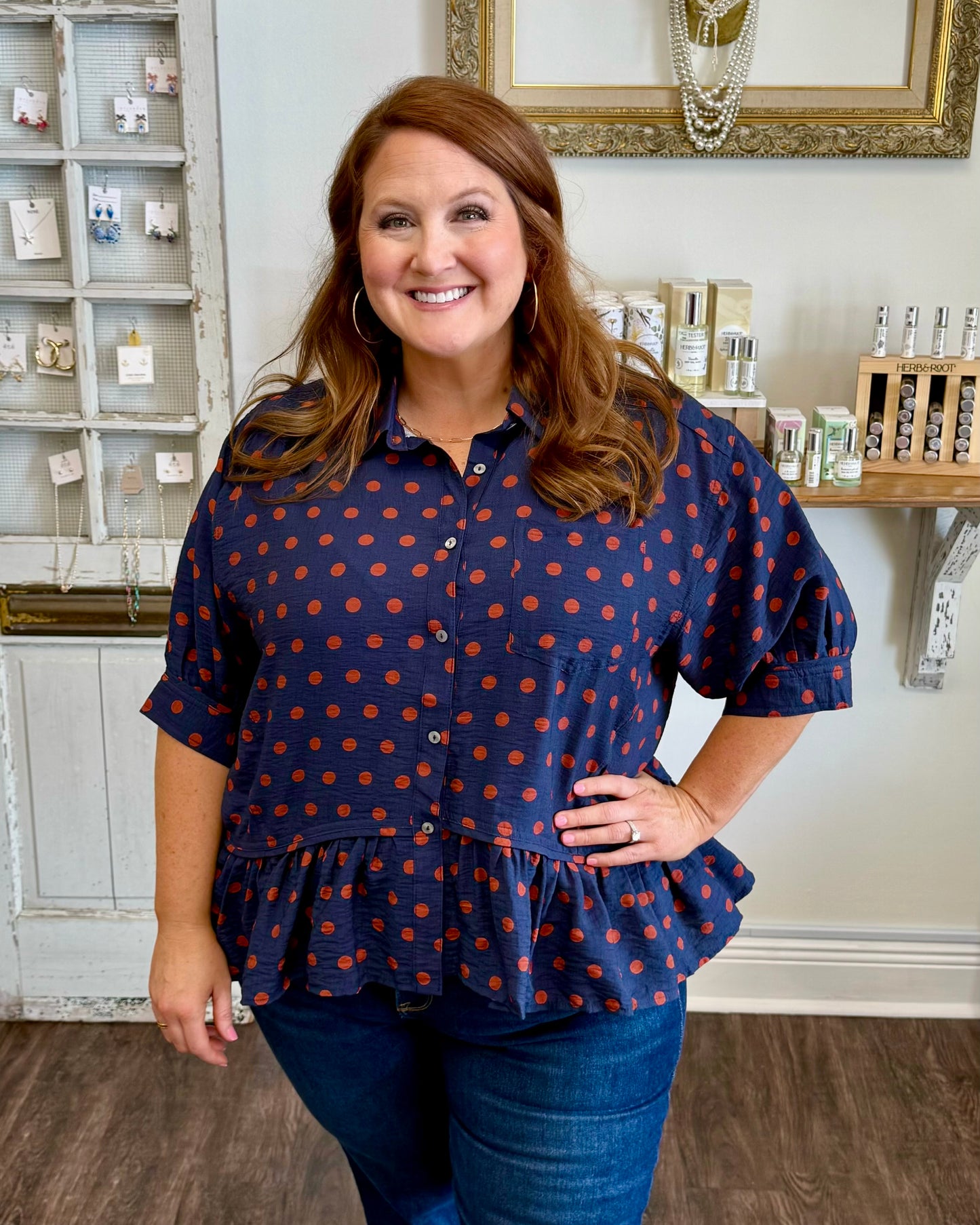 Navy Polka Dot Ruffle Hem Top