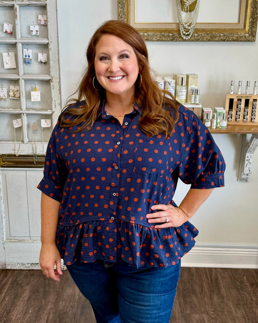 Navy Polka Dot Ruffle Hem Top