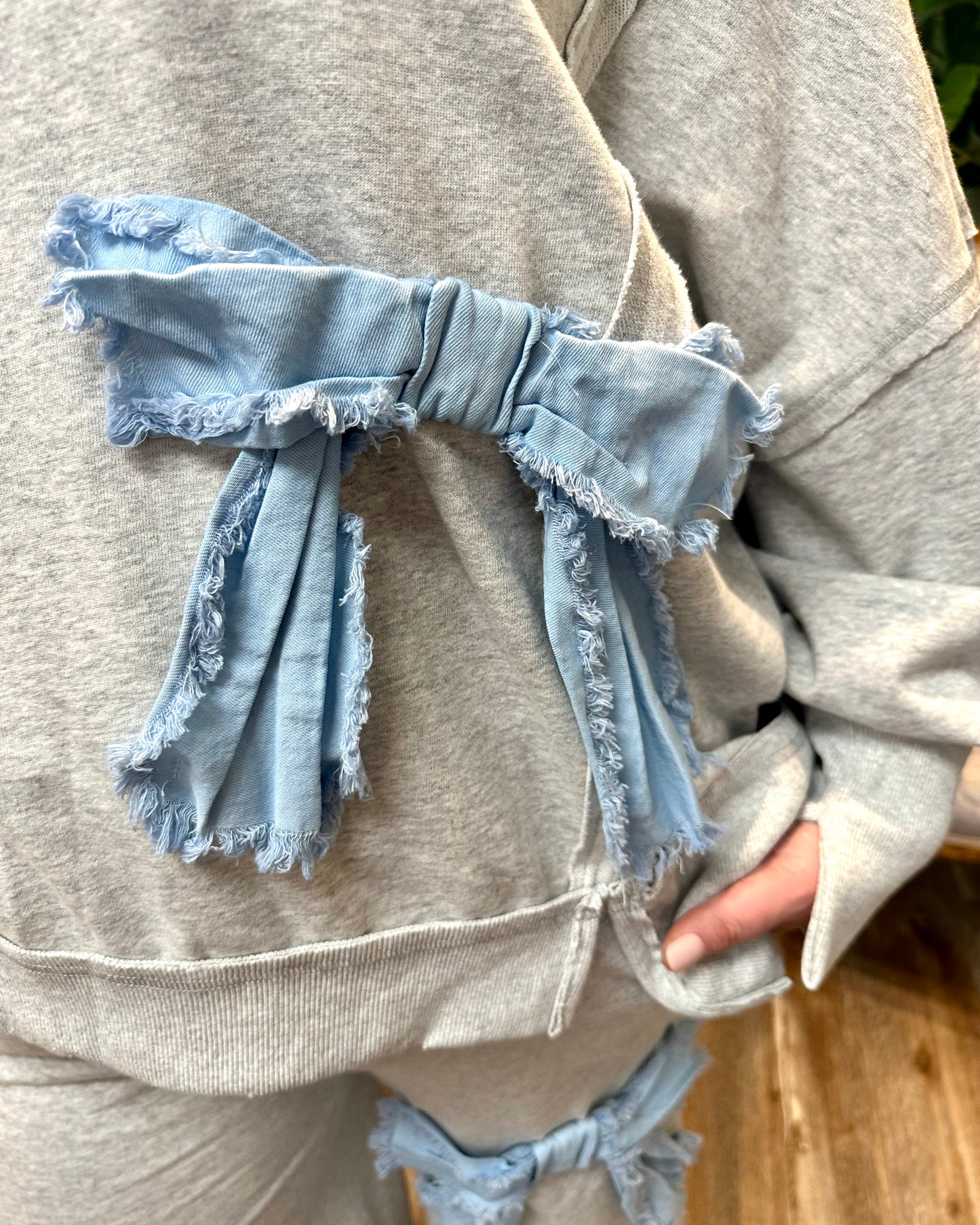 Frayed Washed Sweatshirt with Denim Bow
