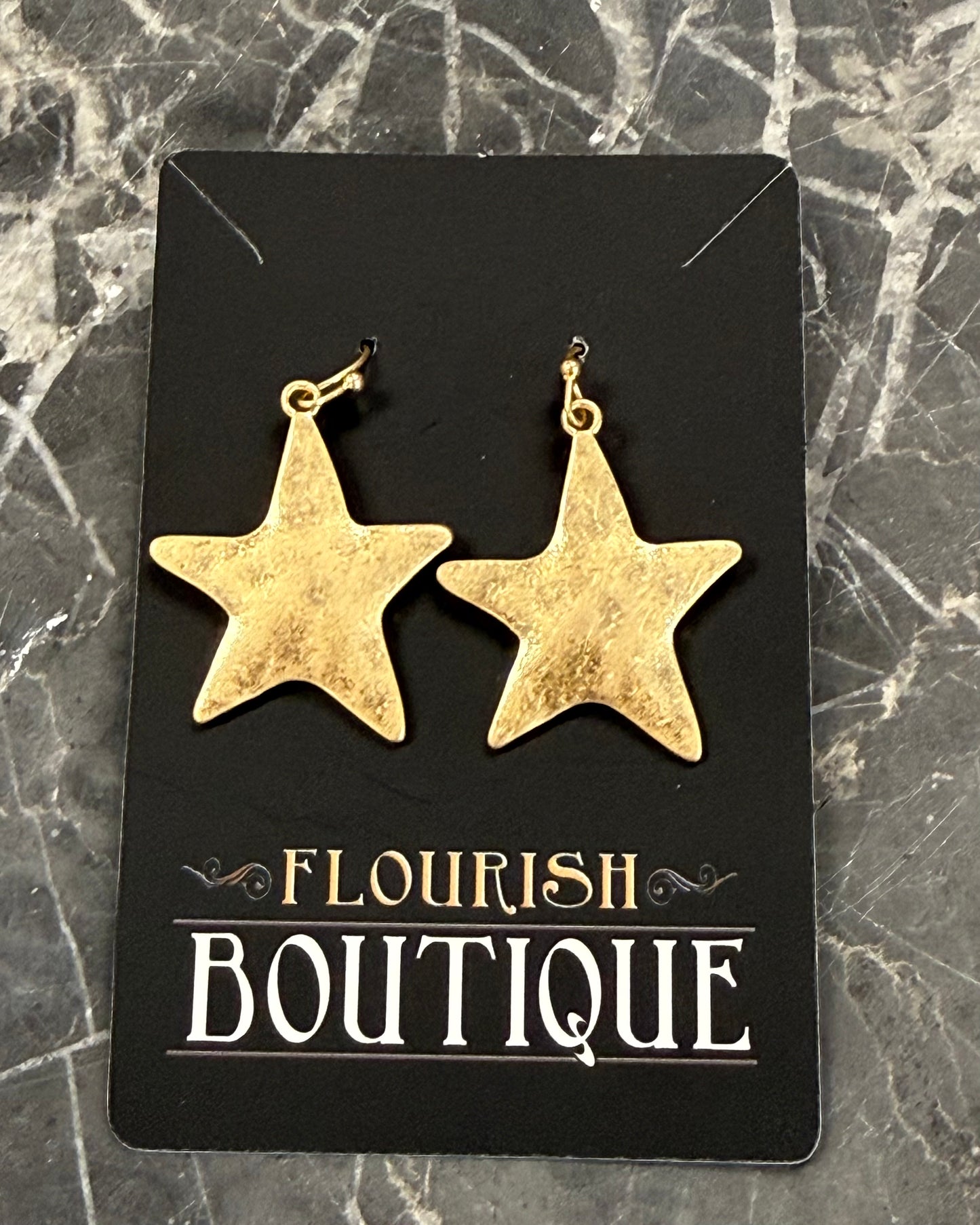 Gold Dangle Star Earrings